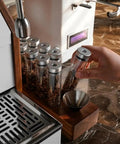 12 Piece Single Dose Coffee Bean Storage Tubes With One Way Exhaust Valve Glass Vials On Sturdy Walnut Wood Base for easy coffee dosing