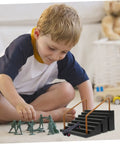 Child playing with Fingerboard Skateboard Ramp Set Two Piece Mini Skatepark Obstacle Accessories on carpet