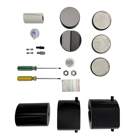 Badass Desktop Digital Rockwell Hardness Tester Featuring Slick Touch Screen And Microcomputer Control For Bullseye Accuracy On Raw Alloy Surfaces Hrts 150 parts and accessories laid out, including discs, screws, and tools.