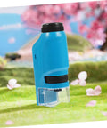 Portable Handheld Microscope For Students With Safe Lightweight Design standing on grass with cherry blossoms in background