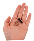 Hand holding components from Wood Furniture Threaded Inserts Kit With Bolts Nuts Wrenches And Drill Bit 50 Piece Metal Connector Hardware Set