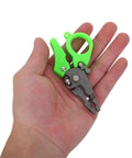 Heavy Duty Mini Wire Stripper And Cutter Pliers in a hand, compact green handle, ideal for tight electrical jobs.