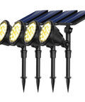 600 Lumen Solar Outdoor Lights Waterproof Landscape Spotlights Solar Powered Walkway Pathway Garden Lights Backyard Patio Decor Warm White 4 Pack Built Tough For All Weather, showing four black stakes with warm white LEDs and solar panels
