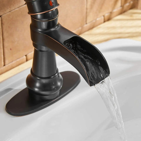 Oil Rubbed Bronze Waterfall Bathroom Sink Faucet With Single Handle 1 Hole Mount No Fuss Easy Install Pop Up Drain Assembly And Durable Supply Hose Farmhouse Vanity Bath Faucet with water flowing in sink.