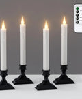 Four 9.64 inch ivory taper candles with remote control, showcasing cozy warm glow for Christmas home decor and holiday ambiance.