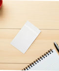 Clear Glassine Envelopes 200 Pack Self Sealing Small Paper Bags For Treats Seeds Cards Invitations And Mailings on wooden table