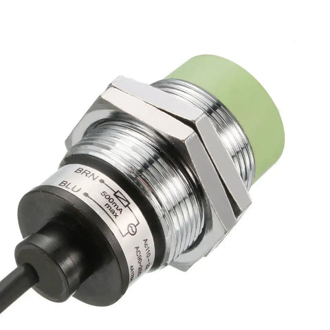Cylindrical inductive proximity sensor switch 15mm detect distance for iron objects with 30mm thread, industrial grade durable.