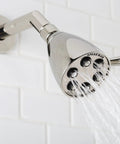 S-2252-PN-E2 Signature Brass Icon Anystream Adjustable Shower Head with 360 Degree Spray in use, polished nickel finish
