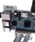 Solid Grip Din Rail Mount For Raspberry Pi featuring killer cooling with micro USB strain relief on a bracket attached to a Pi.