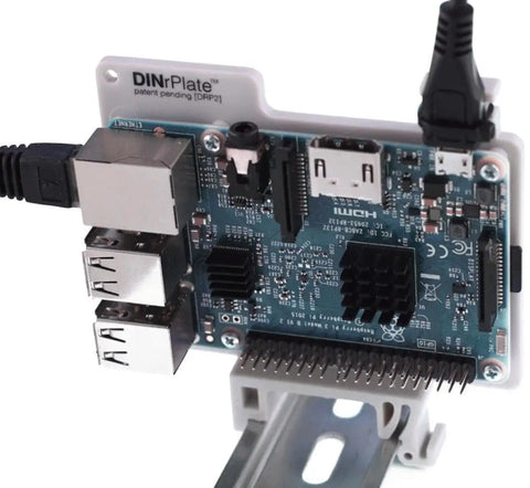 Solid Grip Din Rail Mount For Raspberry Pi featuring killer cooling with micro USB strain relief on a bracket attached to a Pi.