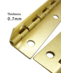 Grab These 4 Heavy Duty Folding Butt Hinges For Your Diy Furniture Projects, Featuring Sturdy Iron Construction That Holds Up Great To Wear And Tear While Adding A Classic Flair To Your Tables Or Cabinets Today. Close-up of 0.7mm thick heavy duty iron folding butt hinge with round screw holes.