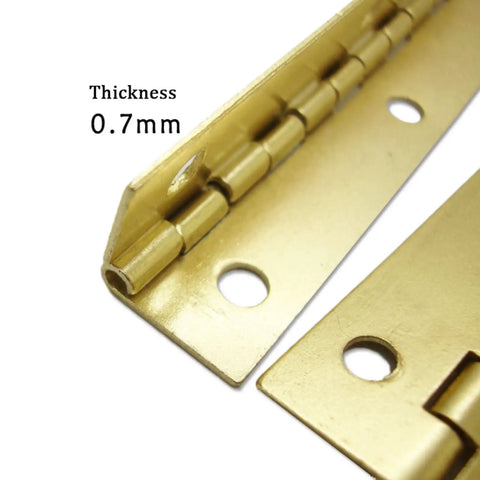 Grab These 4 Heavy Duty Folding Butt Hinges For Your Diy Furniture Projects, Featuring Sturdy Iron Construction That Holds Up Great To Wear And Tear While Adding A Classic Flair To Your Tables Or Cabinets Today. Close-up of 0.7mm thick heavy duty iron folding butt hinge with round screw holes.