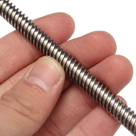 Close-up of a hand holding an 8mm lead screw 1000mm with brass nut and bearing bracket for 3D printer CNC