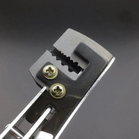 Close-up of the cutting head of Top Tier Automatic Wire Stripper Slick Cable Crimper And Diagonal Cutter Plier with serrated edge.