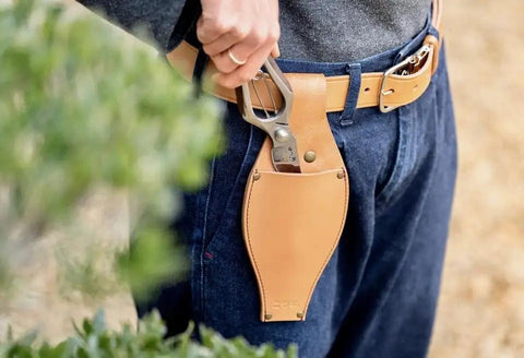 Tough As Nails Line Twenty Four Snap Fasteners With Long Post Black Plated Military Grade Hardware No Fuss Hammer Install Kicks Up Outdoor Projects And Delivers Rock Solid Hold in a leather pouch on a belt.