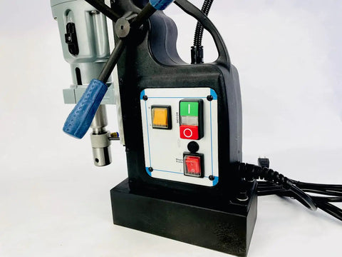 Control panel and motor of Black 60mm Magnetic Drill With Rock Solid 52 Lb Base Two Speed Reversible Motor heavy duty drill.
