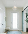 Farmhouse Six Light Wood Chandelier In Distressed White with cozy vibe in bright hallway with sliding doors