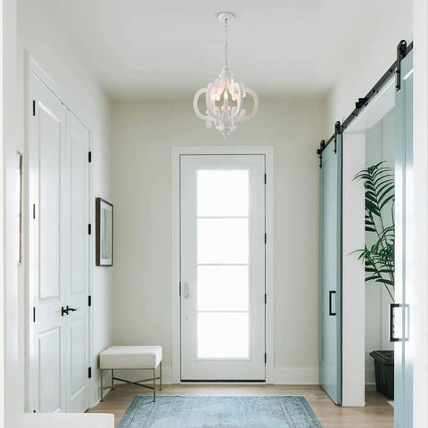 Farmhouse Six Light Wood Chandelier In Distressed White with cozy vibe in bright hallway with sliding doors