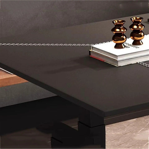 Modern Electric Standing Desk No Sweat One Touch Adjustable Height Workstation with black tabletop and decorative items on it.