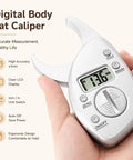 Digital Body Fat Caliper With LCD Display For Quick Skinfold Readouts, Portable Body Composition Tool With Tape Measure, Switchable Mm In Units For Men And Women At Home, Gym, Or Travel Use in hand