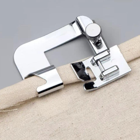 Universal Sewing Machine Presser Feet Set For Home Electric Models With Zipper Foot Binder Attachment And Overlock Presser, close-up of binder foot on fabric.