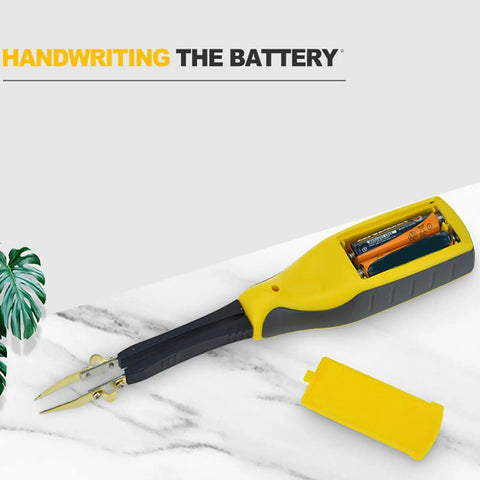 Handheld Digital Multimeter For Electronics Testing With LED And Diode Check, battery compartment open on marble surface