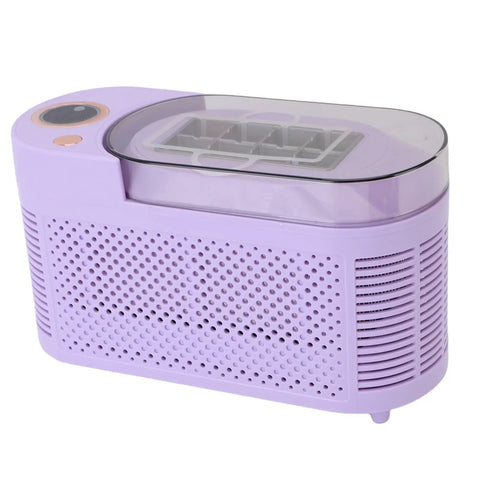 Compact Counter Ice Maker Cranks Out Eight Chill Cubes Quick And Slick Lil Build in purple with window and control buttons.
