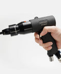 Pneumatic Rivet Nut Gun With Four Size Pro Grade Quick Change Nose Pieces Air Rivet Nut Setter Tool in hand, 3/8 inch size shown.