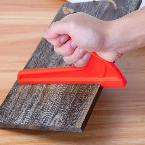 Bright red ABS safety push stick in use on wood, part of 4 Pack Safety Push Sticks For Table Saw And Woodworking