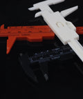 Mini Plastic Vernier Caliper Set 0 To 3 Inches 0.05mm Precision Double Scale Sliding Gauge For DIYers And Mechanics, showing red, white, and black calipers