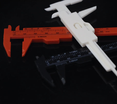 Mini Plastic Vernier Caliper Set 0 To 3 Inches 0.05mm Precision Double Scale Sliding Gauge For DIYers And Mechanics, showing red, white, and black calipers