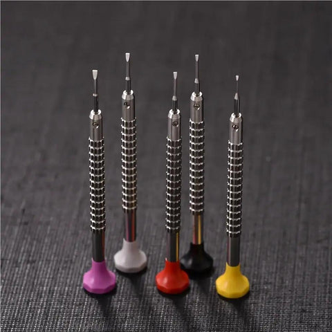 Watch Repair Screwdriver Kit With Color Coded 3 Piece And 1 Piece Set, stainless steel heads, shown on a black surface.