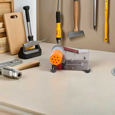 Plug And Play Mini Electric Belt Sander With Twenty Emery Belts Heavy Duty Desktop Grinder on a workbench with tools.