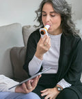 Personal Pocket Peak Flow Meter With Smartphone App For Home Lung Function Monitoring PEF And FEV1 Readings Sync Results To Your Health Care Provider No Prescription Needed Easy To Use woman testing breathing at home