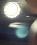 Close-up of PSX24W 2504 LED Fog Light Bulbs in use, 6000K xenon white glow, 2800 lumens, auto 12V fog lamps replacement, plug and play