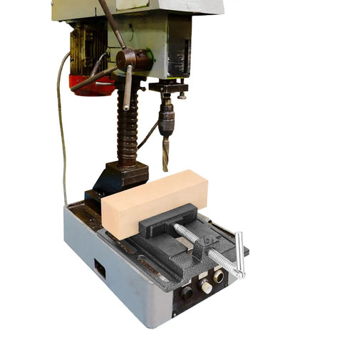 2 Pack 4 Inch Portable Drill Press Vise With Slotted Base Made From Durable Cast Iron For Dead Solid Grip Wood And Metal Clamping Light Duty Bench Fixture Easy Setup Workshop Staple Black, mounted on drill press holding wood.