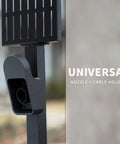 Ride-Ready Outdoor EV Charging Pedestal Housing a Tough Steel Hood shielding plug-in with black universal nozzle and cable holder.
