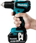 Person holding 18V LXT Brushless Cordless Half Inch Drill Driver Kit With 3.0Ah Battery, Variable Speed, Two Speed Transmission 0-500 And 0-1900 RPM, Delivers 440 Inch Pounds Max Torque, Your Go To Tool For Drilling And Fastening