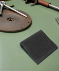 Self Adhesive Soundproof Foam Board For Outdoor Air Conditioner Units 11X25 Inch on green background with tools.