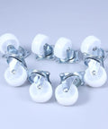 8 Pcs Inch PP Swivel Caster for Furniture and Office Chairs, six white wheels with metal bases arranged on a gray background.