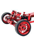 Close-up of Beefed Up RC Car Upgrade Kit for 1/24 Scale featuring red metal wheel hub tires with flexible rubber grips