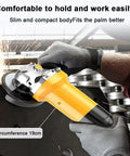 Tough As Nails 125Mm Electric Angle Grinder With 1050W Motor And 11000Rpm Speed held comfortably for metal cutting and sanding tasks.