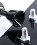 Close-up of Carbide Deburring Tool For Chamfering External Edges On Threaded Rods Bolts And Pipes next to bolts