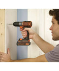 Person using 20V Max PowerConnect Cordless Drill Driver With Autosense Technology for precise screws in tight spots