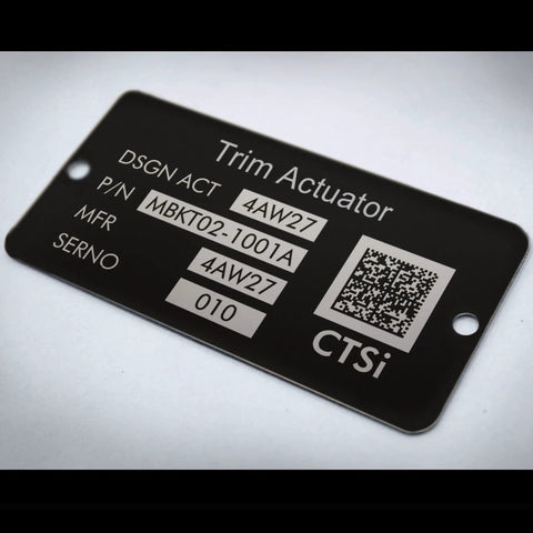 Black Trim Actuator nameplate with P/N MBKT02-1001A, MFR 4AW27, SERNO 4AW27 010, CTSi logo and QR code