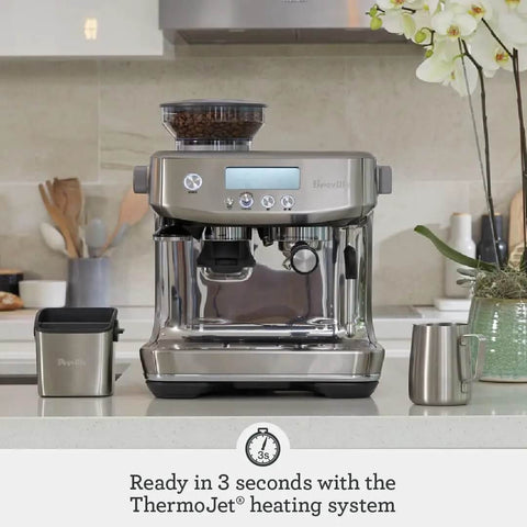 Barista Pro Espresso Machine With Built-In Grinder And 4 Keys Formula shown on kitchen countertop, sleek black truffle finish, dose control grinding