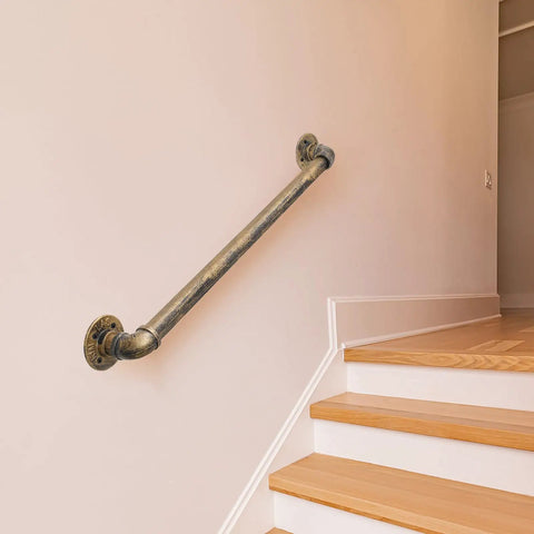 Heavy Duty Industrial Staircase Handrails 3 Ft Galvanized Pipe mounted on a wall beside wooden stairs for indoor use.