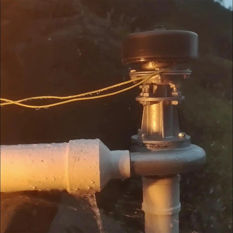 Close-up of Rugged 1000W Hydroelectric Generator For Off Grid Camping And Outdoor Living With Dual 110V 220V Output 3500 RPM.