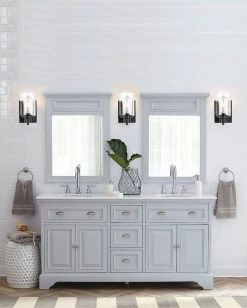 2-Pack Dope Modern Bath Vanity Light Fixtures With Seeded Glass Sconces in black over double mirrors in a modern bathroom.