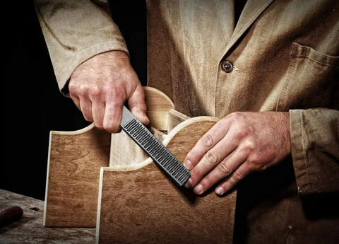 Craftsman using Two Pack 4 Way Wood Rasp File Set With Premium High Carbon Steel on wooden project